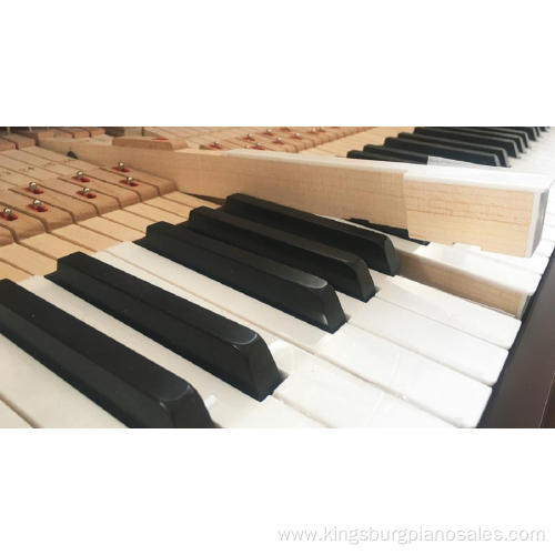 living room with upright piano